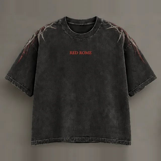 Aquila Tee, front view — RED ROME in red at the chest, silver and red thorns across both shoulders, on washed black